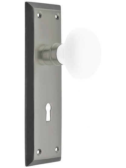 Classic New York Style Mortise Lock Set in Antique Pewter with White Porcelain Door Knobs.
